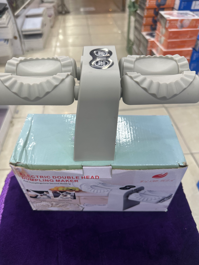 مكينة صنع السمبوسة